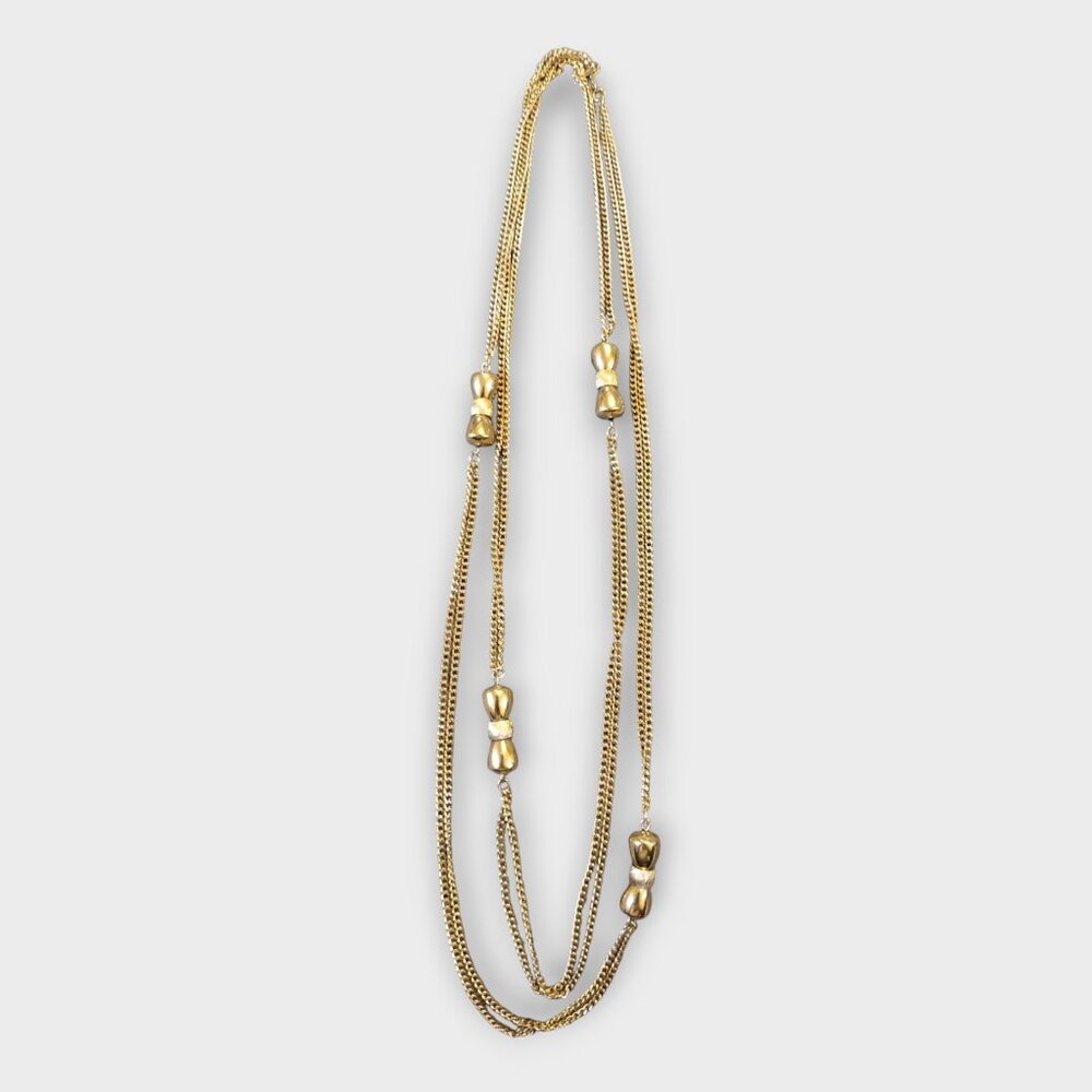 VTG Monet Goldtone Bowtie Pat. Pending Necklace